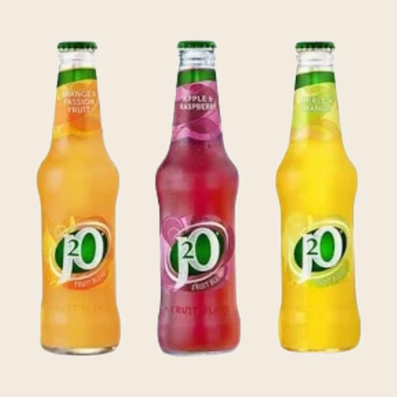 Three J2O bottles — orange and passion fruit, apple and raspberry, and apple and mango