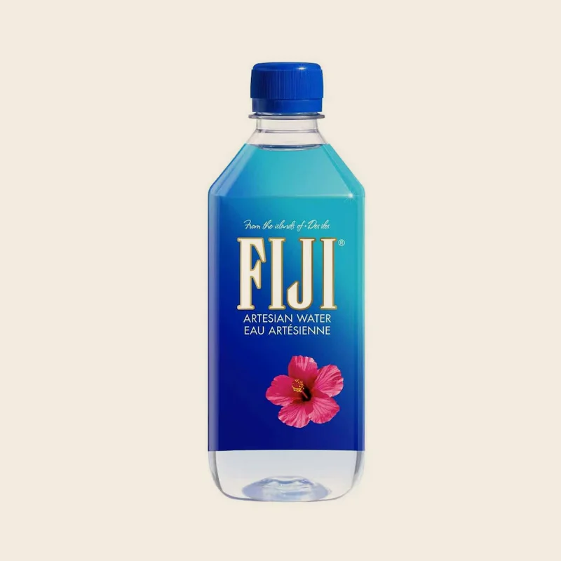 A bottle of still water on a dark table